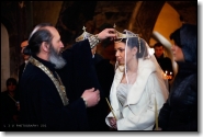 Wedding - the priest and the bride. Photo by Levan Chkhatarashvili